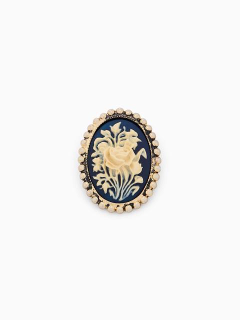 EMPORIO ARMANI BRASS CAMEO BROOCH WITH A FLORAL MOTIF AND BEADED BORDER