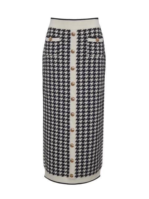 Cara Cara Ronnie Skirt
Houndstooth Chic Meets Modern Flair