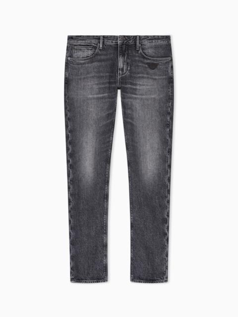 EMPORIO ARMANI J06 SLIM-FIT WASHED DENIM JEANS WITH EAGLE EMBROIDERY