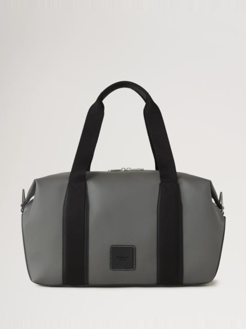 Dalston Holdall
Asphalt & Black Coated Canvas & Rubberised Leather