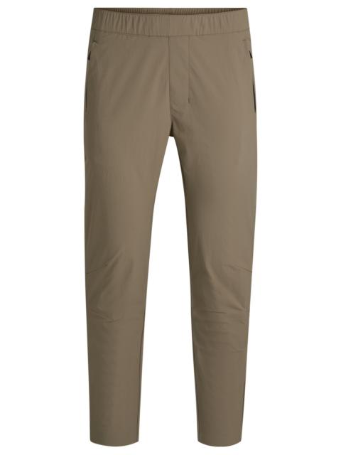 BOSS TAPERED-LEG TROUSERS IN WATER-REPELLENT STRETCH FABRIC