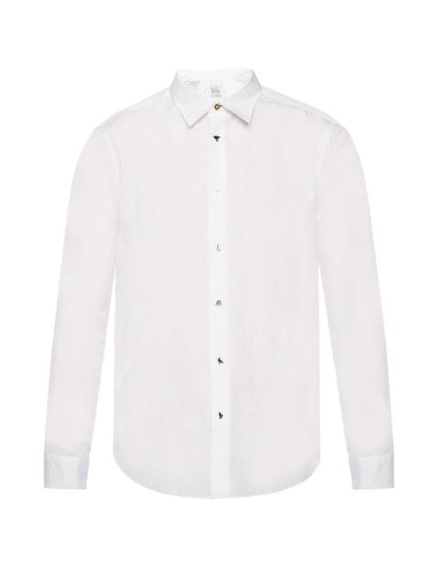 Shirt with decorative buttons