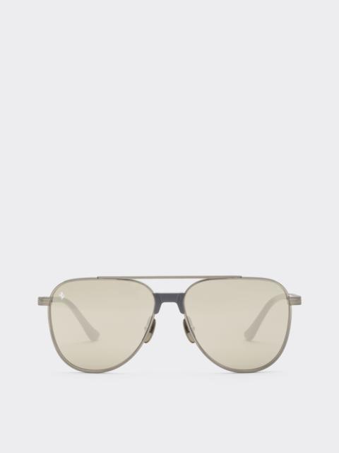 Ferrari Ferrari sunglasses in  brushed silver titanium and acetate with transparent gold lenses with white m