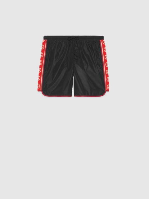 GUCCI Nylon swim shorts with logo stripe