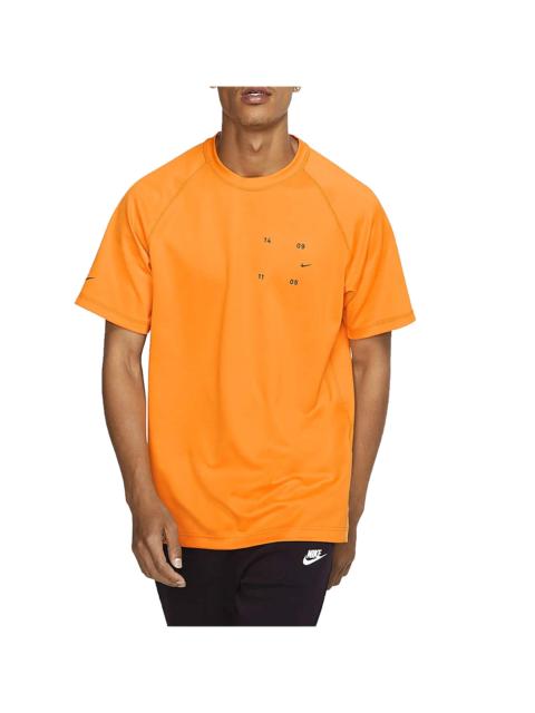 Nike Sportswear Tech Pack Tee "Kumquat / Black" BV4441 886