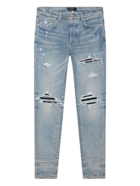 AMIRI MX1 distressed jeans