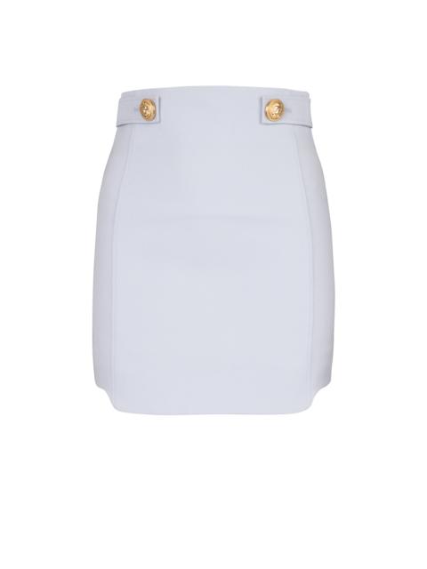 Short wool skirt with gold buttons