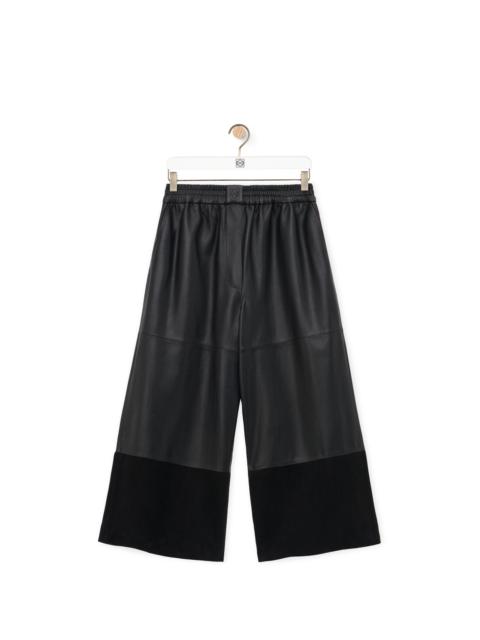 Cropped trousers in satin nappa lambskin and suede goatskin