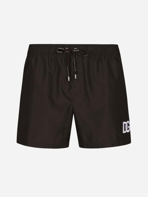 Short swim trunks with DG logo patch