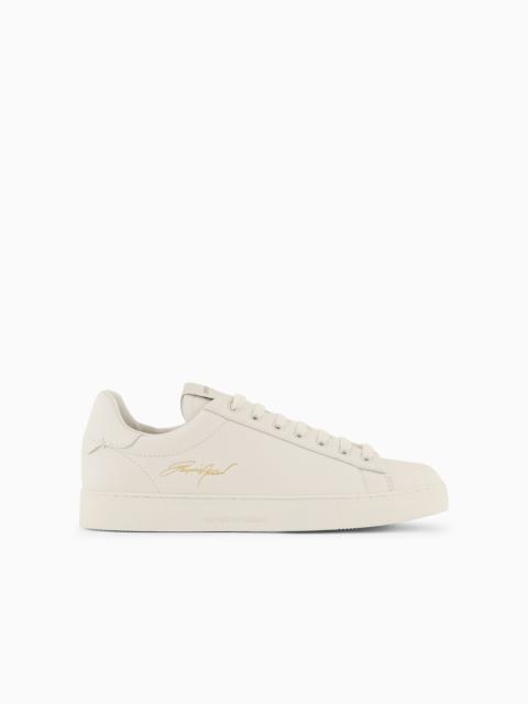 EMPORIO ARMANI Leather sneakers with gold signature logo