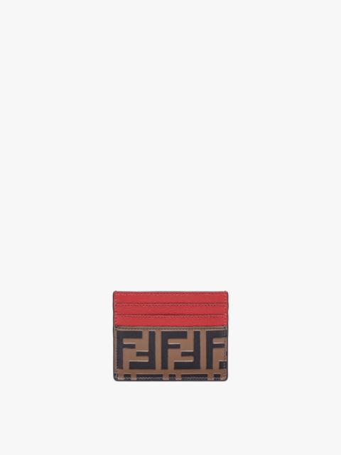 F is Fendi card holder with central compartment and six card slots. Finished with Fendi Roma logo an