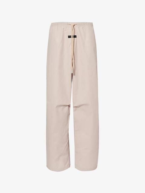Elasticated-waistband brand-appliqué mid-rise wide-leg cotton-blend trousers