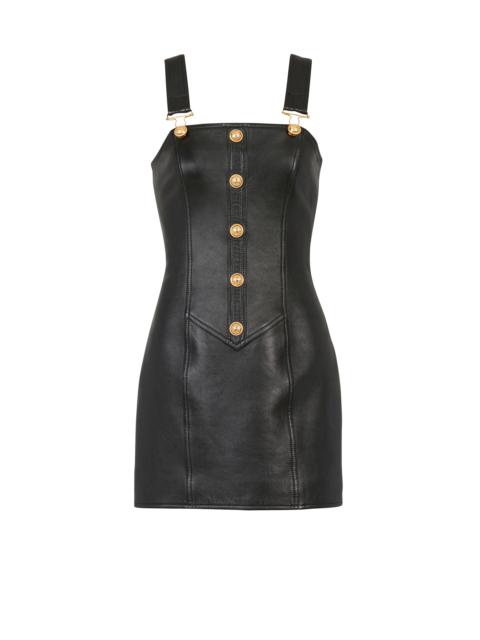 Short leather overall dress