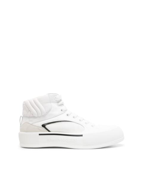 Seal-embroidered leather sneakers