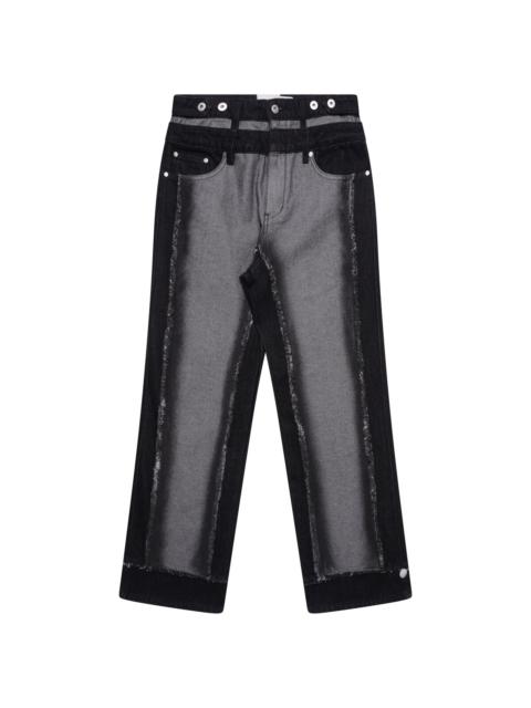 FENG CHEN WANG Raw Edge Patchwork Jeans in Black