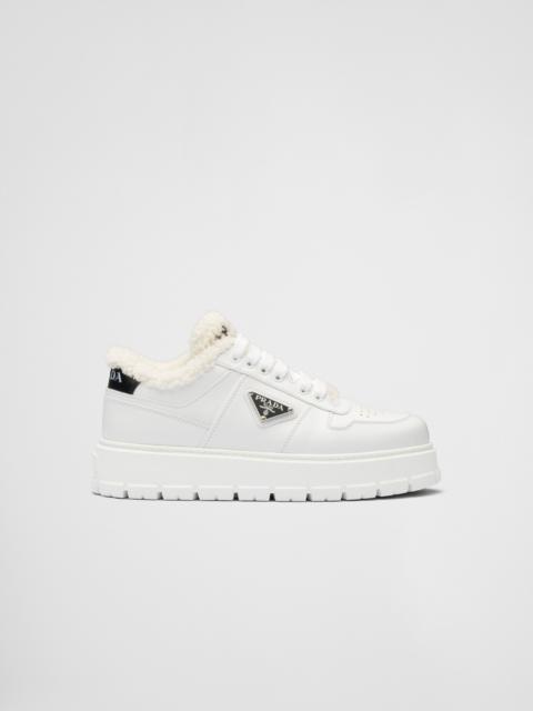 Prada Leather and shearling sneakers