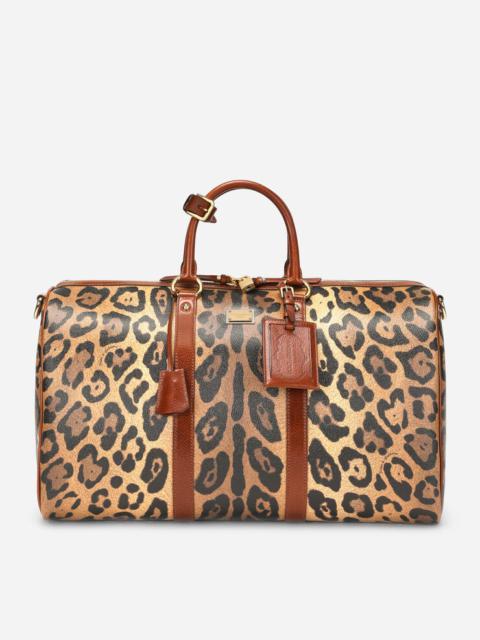 Medium travel bag in leopard-print Crespo with branded plate