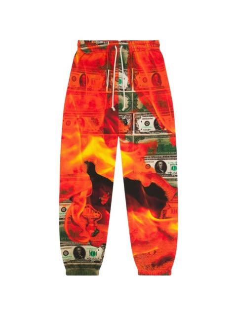 DENIM TEARS Burn It All printed track pants