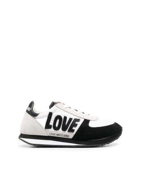 Moschino logo-patch sneakers