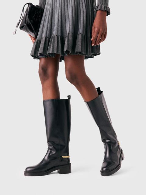 maje Flat leather boots with chain