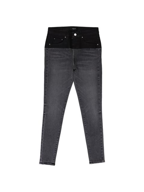 AMIRI CONTRAST FABRIC WITH LEATHER AGED SKINNY JEANS "Aged Black, Black Leather"