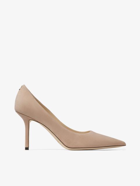 JIMMY CHOO Love 85
Ballet-Pink Suede Pointed Pumps with JC Emblem