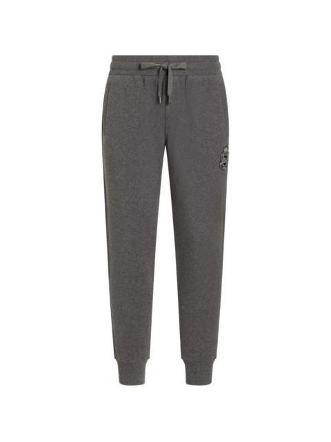 Dolce & Gabbana jersey trousers with heraldic patch