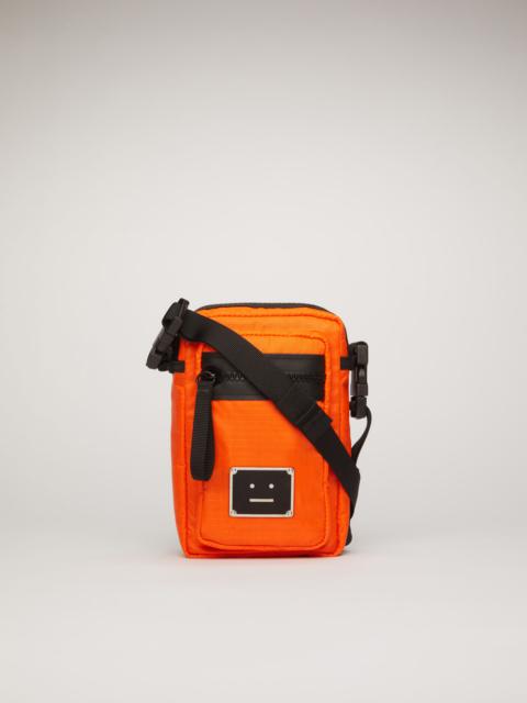 Acne Studios Logo plaque pocket bag dark orange