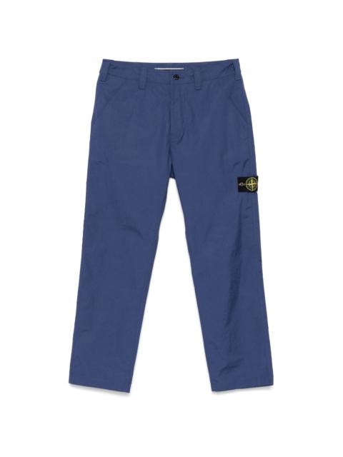 Compass-badge trousers