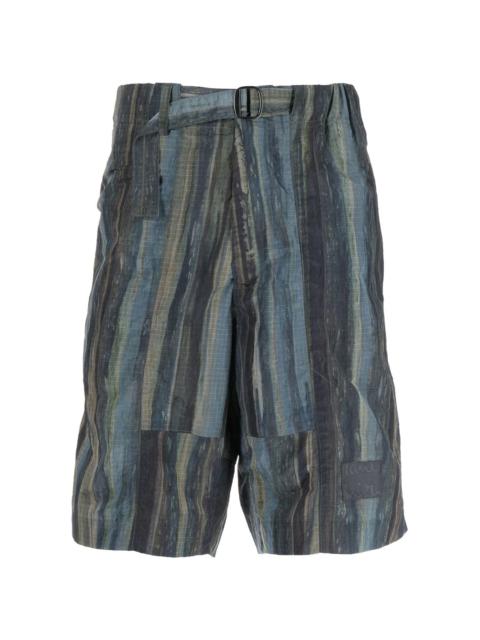 Woodland-print Bermuda shorts