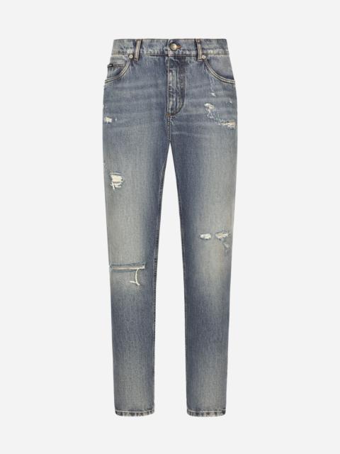 Regular-fit blue wash jeans with abrasions