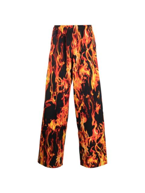 VETEMENTS fire-print elasticated-waist cotton trousers