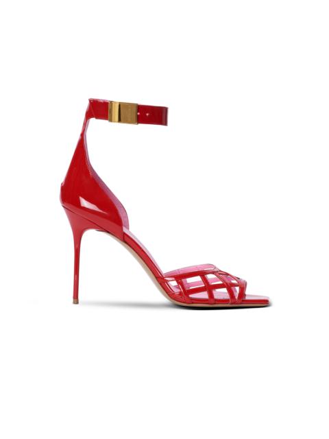 Patent leather Uma sandals with openwork grid