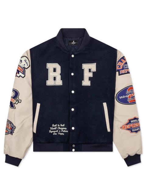 REPRESENT FEATURE X REPRESENT CHAMPIONS VARSITY JACKET - MIDNIGHT NAVY