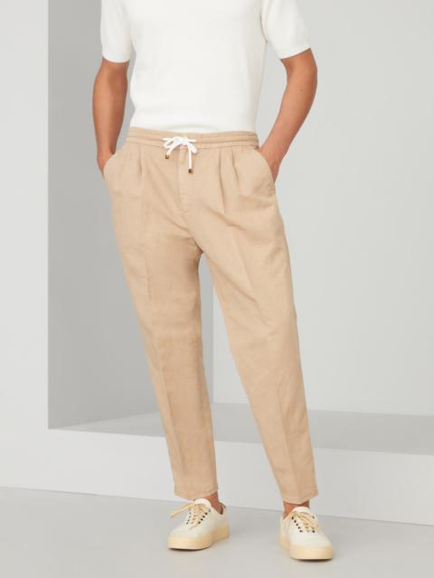 Garment-dyed leisure fit trousers in twisted linen and cotton gabardine with drawstring and double p