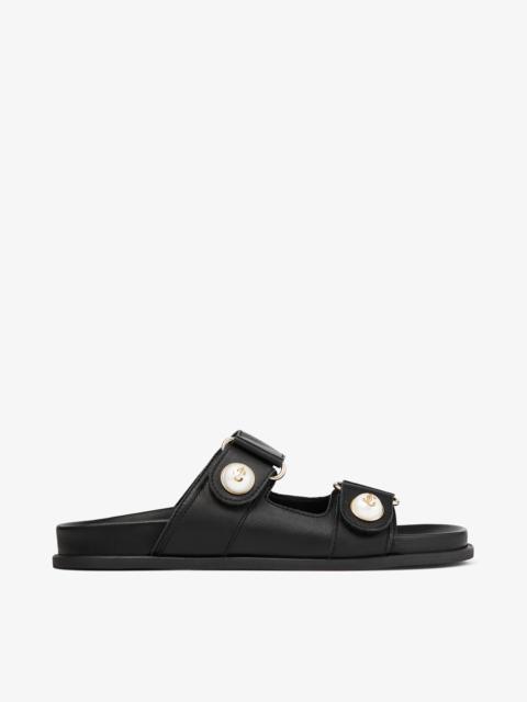 Fayence Sandal
Black Leather Flat Sandals with Pearl Embellishment