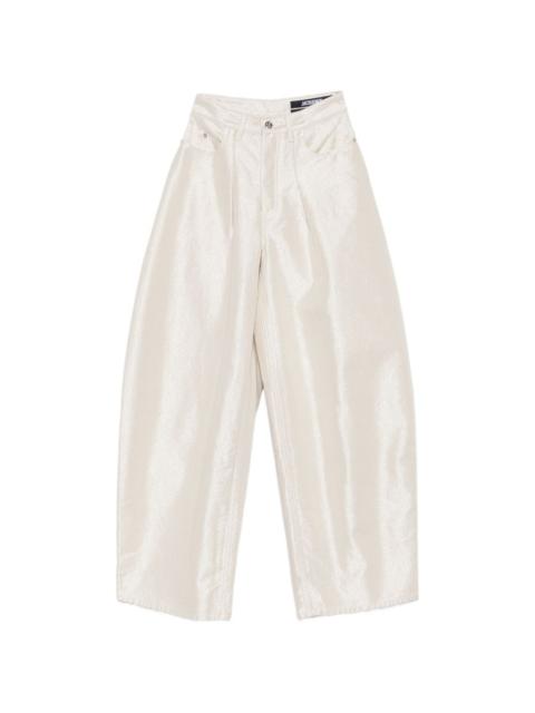 JACQUEMUS De-Nîmes Ovalo metallic-finish wide-leg jeans