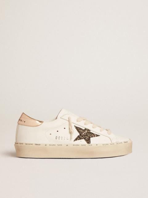 Golden Goose Hi Star LTD with black and gold glitter star and gold heel tab