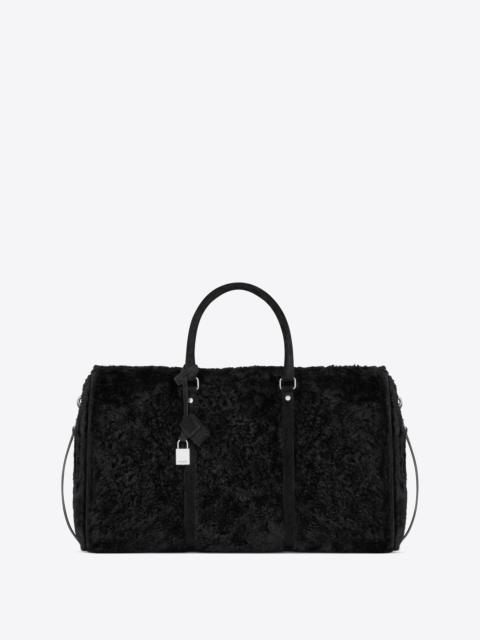 SAINT LAURENT le monogramme 48h duffle in shearling and suede