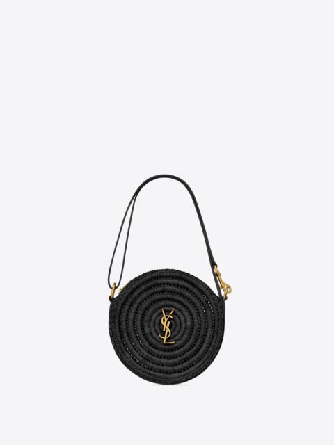SAINT LAURENT round bag in raffia and vegetable-tanned leather