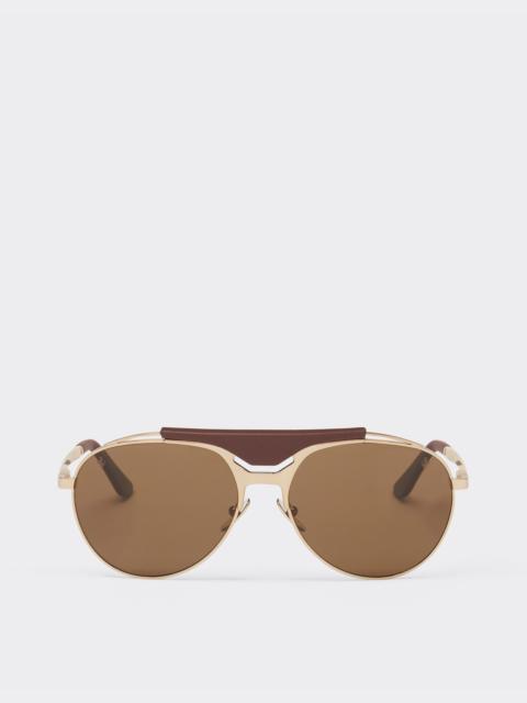 Ferrari Ferrari sunglasses in gold-tone metal and leather with polarised brown lenses