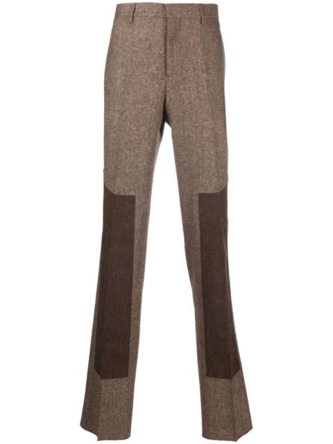 Moschino tailored-cut panelled trousers