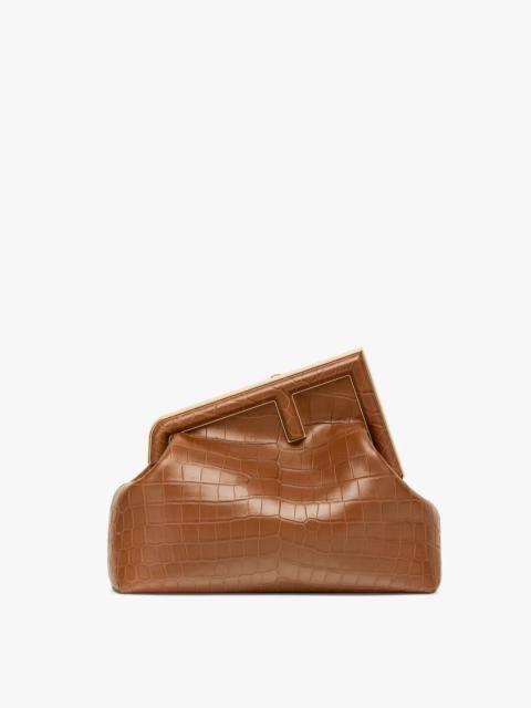 FENDI Medium Fendi First bag in exquisite brown crocodile leather with an oversized F metal clasp with ton
