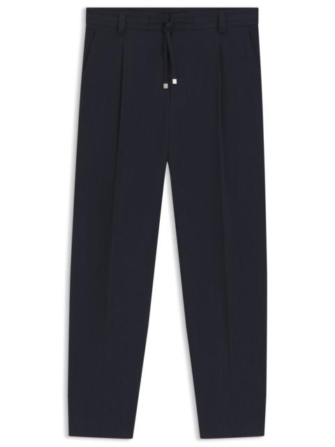 HUGO MODERN-FIT PANTS IN PERFORMANCE-STRETCH SEERSUCKER