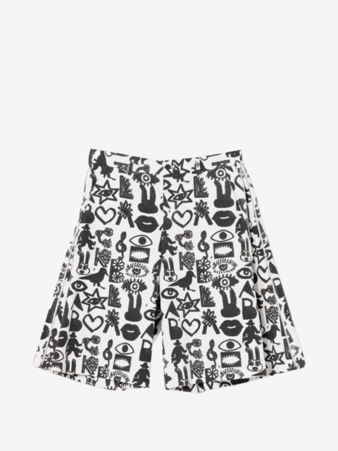 BLACK COMME des GARÇONS graphic-print zip shorts