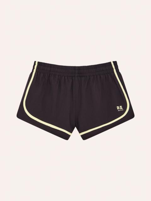 P.E NATION STRIDE RUNNING SHORT IN BLACK BEAN & SOFT YELLOW