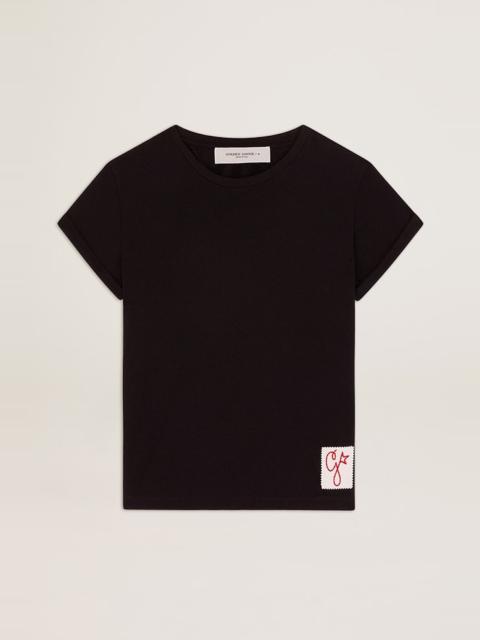 Women’s slim-fit distressed T-shirt in black