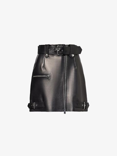 Buckle-embellished zip-front leather mini skirt