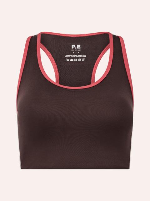 P.E NATION STELLAR SPORTS BRA IN DARK PLUM & STRAWBERRY