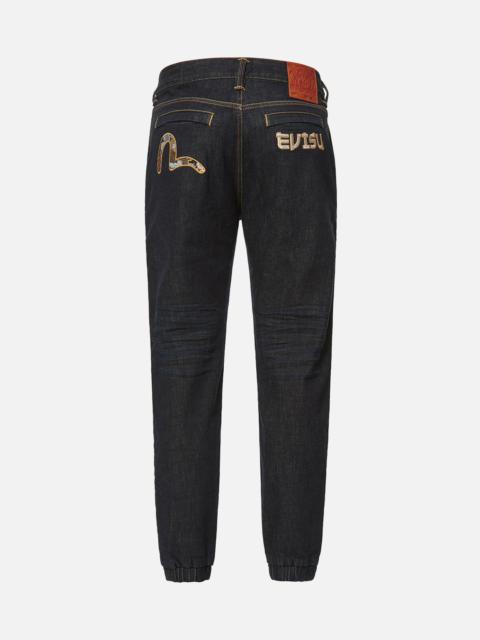 EVISU BROCADE SEAGULL APPLIQUÉ DENIM JOGGER PANTS